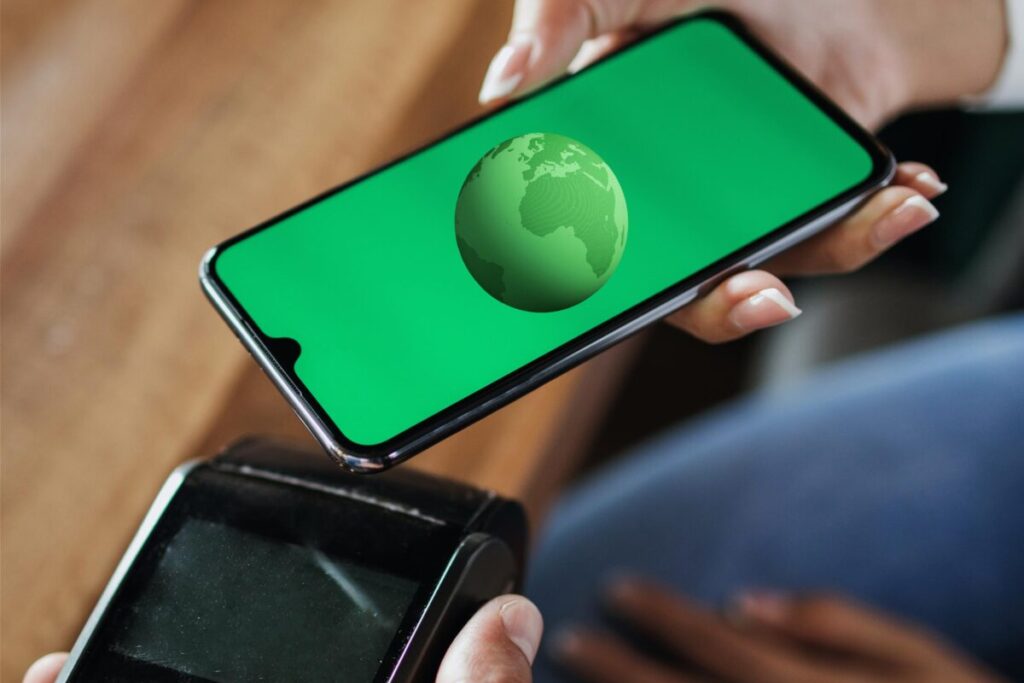 Phone with a green earth icon on it